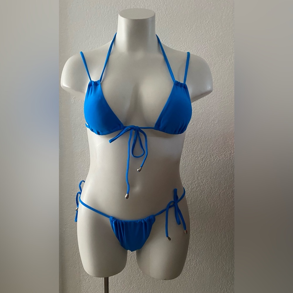 Very sexy, elegant laced up blue two piece